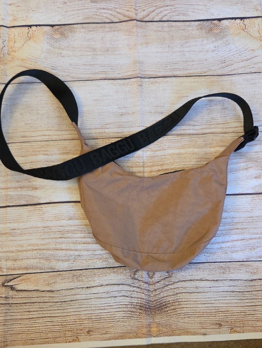 Small BAGGU Crescent Sling Bag in Tan with Black Strap
